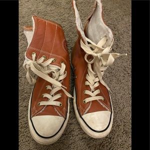 Brown High Tops with white faux fur on the inside